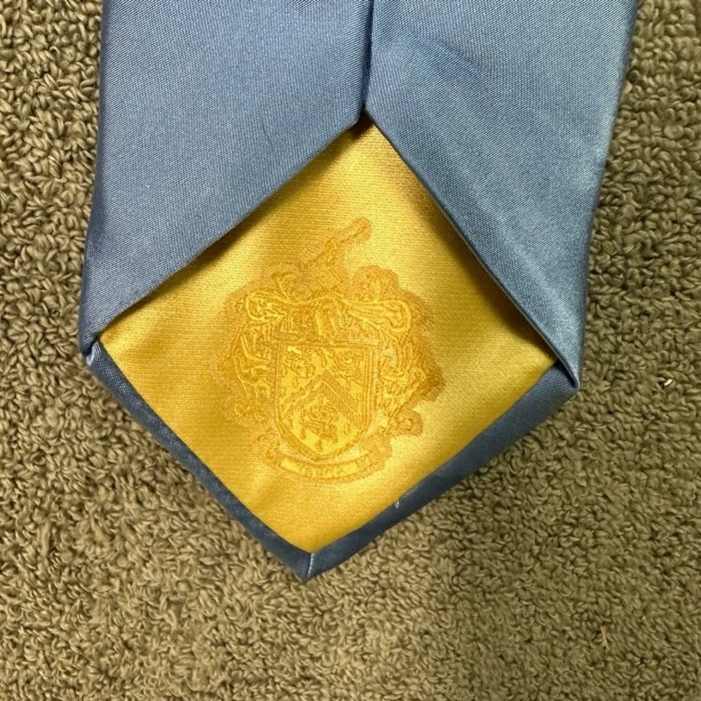 Donald J Trump Signature Collection Silk Tie Solid Light Blue Gold Crest Logo
